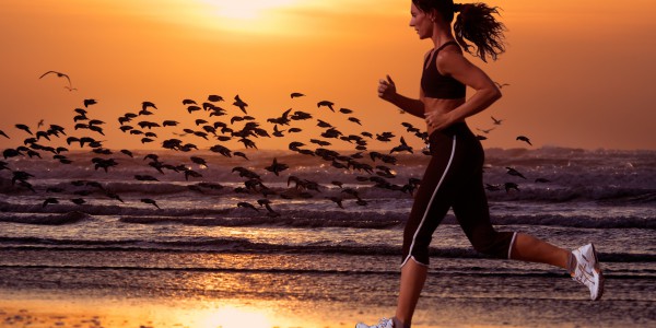 woman running on the beach